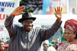 Nigerian-President-Goodluck-Jonathan,-standing-next-to-his-wife,-Patience,.jpg
